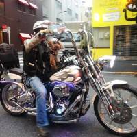 \"Hidden Biker,\" with a focus on a puppy in a biker\'s outfit, by Farukh Amil, ambassador of Pakistan, won the Grand Prize. | FARUKH AMIL