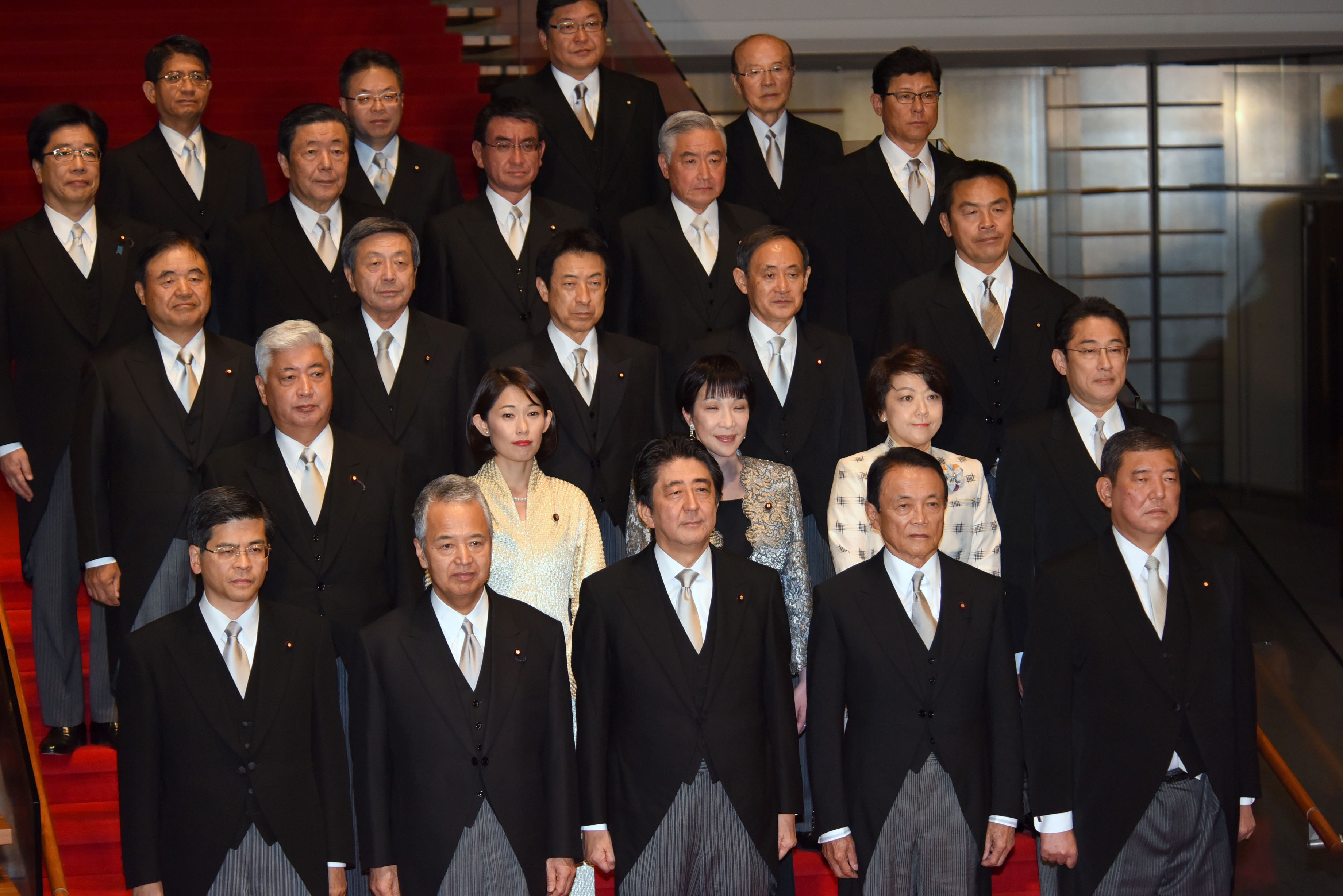 In Cabinet reshuffle, Abe shifts focus to economy but retains key ministers  | The Japan Times