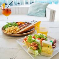 Inner-city holiday: The Beach 55 provides fun in the sand for kids while parents can enjoy barbecued meats. The Beach 55