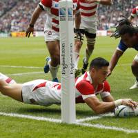 Akihito Yamada scores try against Samoa during their match Saturday in Milton Keynes, England. | REUTERS
