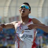Abdul Hakim Sani Brown burst onto the scene with some impressive results on the track this summer. Sani Brown is one of a growing number of biracial Japanese athletes. | KYODO