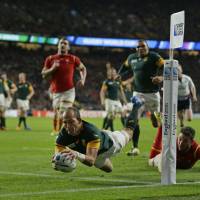 South Africa\'s Fourie Du Preez scores a try during the Springboks\' 23-19 win over Wales in their Rugby World Cup semifinal at Twickenham on Saturday. | AP