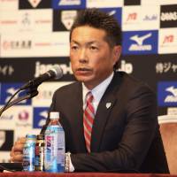 Samurai Japan national baseball team skipper Hiroki Kokubo announces his 28-man roster for the Premier 12 tournament at a Tokyo news conference on Friday. | REIJI YOSHIDA