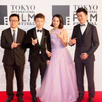 The cast of \"The Ark of of Mr. Chow\" mug for the camera at the opening of the 2015 Tokyo International Film Festival on Thursday.  | MANCE THOMPSON