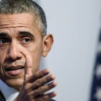 U.S. President Barack Obama gestures during a press conference following the G-20 summit in Antalya on Monday. Obama said the United States had no precise intelligence warning of the Paris bombing and shooting attacks that have been claimed by Islamic State. The United States has agreed to speed up its sharing of military intelligence with France to try to avert such assaults, he added in a news conference after a summit in Turkey. | AFP-JIJI