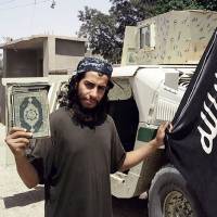 Belgian militant Abdelhamid Abaaoud, the suspected mastermind of a the Paris terrorist attacks, is seen in a picture from a February 2015 edition of the Islamic State group\'s online English-language magazine. | AFP-JIJI