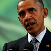 U.S. President Barack Obama delivers remarks after meeting with Philippine President Benigno Aquino III on the sidelines of the Asia-Pacific Economic Cooperation summit in Manila on Wednesday. | REUTERS