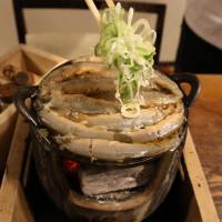 Loach stew is served at Komakata Dozeu, a restaurant with two centuries of history, in Tokyo’s Taito Ward. | RINI ISHII