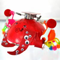 Takoyama Deluxe is a Hebocon robot made by an elementary school student from a ball, a radio-controlled car and various toy adornments. | YOSHIAKI MIURA