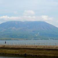 Mount Sakurajima is seen from the city of Kagoshima on Wednesday. | KYODO