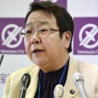 Tomoko Nakagawa, the mayor of Takarazuka, Hyogo Prefecture, holds a news conference in City Hall on Monday. | KYODO