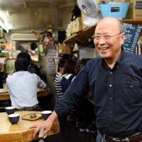 Yukihisa Ota, owner of Matsuso in Tokyo’s Yurakucho district, is dismayed by how commercialized the area has become. | SATOKO KAWASAKI