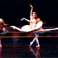 Sylvie Guillem flies gracefully across the stage as Princess Aurora in \"Sleeping Beauty.\" | KIYONORI HASEGAWA