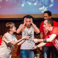A band of Pirates think on their feet during a show in Ebisu. Improv pioneers Pirates of Tokyo Bay plan big bilingual birthday bash