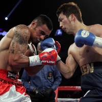 Ryota Murata lands an uppercut during his bout against Gunnar Jackson on Saturday in Las Vegas. | AFP-JIJI