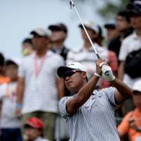 Hideki Matsuyama tees off on the ninth hole during the final round of the CIMB Classic in Kuala Lumpur on Sunday. | AFP-JIJI