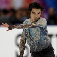 Takahito Mura performs during the men\'s free skate at the NHK Trophy on Saturday. He placed third overall in the two-day men\'s competition. | REUTERS