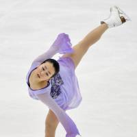 Three-time world champion Mao Asada finished a disappointing third at the NHK Trophy on Saturday. | KYODO