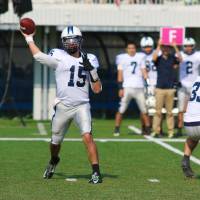 Mason Mills, the Silver Star\'s new American quarterback, throws a pass against the BigBlue in early October. He currently leads the X League in passing yards. KAZ NAGATSUKA | KAZ NAGATSUKA