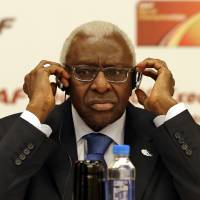 Lamine Diack, the former head of world athletics, has been placed under formal investigation on suspicion of corruption and money laundering. | AP