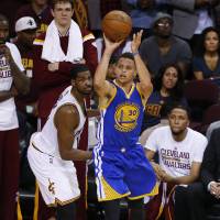 Golden State\'s Stephen Curry puts up a 3-pointer against Cleveland in Game 6 of the NBA Finals in June. Curry was the NBA\'s MVP while leading the Warriors to their first title in 40 years. | AP