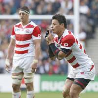Japan fullback Ayumu Goromaru won legions of fans at home and overseas for his outstanding all-around play and distinctive pose before kicking penalties and conversions. | KYODO