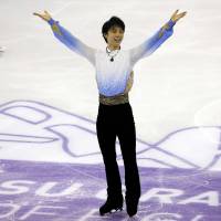 Yuzuru Hanyu acknowledges the crowd after his short program routine at the Grand Prix Final in Barcelona, Spain, in December. | REUTERS
