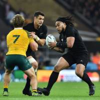 New Zealand\'s Ma\'a Nonu (right) competes during the Rugby World Cup final on Oct. 31 against Australia. The All Blacks captured the world crown with a 34-17 victory. | AFP-JIJI