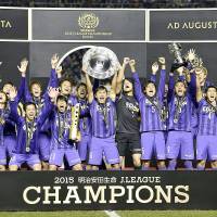 Sanfrecce Hiroshima  celebrate after clinching the J. League title in December, claiming the crown for the third time in four years and the first under the league\'s new playoff format. | KYODO