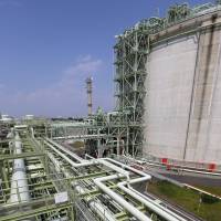 Tanks holding liquefied natural gas are seen at Osaka Gas Co.\'s Senboku terminal in the city of Takaishi, Osaka Prefecture, in August 2013. | BLOOMBERG