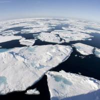 This July 10, 2008, file photo made with a fisheye lens shows ice floes in Baffin Bay above the Arctic Circle, seen from the Canadian Coast Guard icebreaker Louis S. St.-Laurent. In the annual Arctic Report Card, released Tuesday by the National Oceanic and Atmospheric Administration, a record emerged for sea ice, which appears when Arctic Ocean water freezes. When its extent peaked for the year in February 2015, it was the lowest maximum coverage since records began in 1979. Global warming blamed as Arctic posts record heat over land, retreat of ice