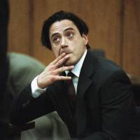 Actor Robert Downey Jr. listens in 1997 to Municipal Judge Lawrence Mira in a Malibu, California, courtroom before being sentenced to six months in jail for violating parole on a prior drug conviction. California Gov. Jerry Brown on Thursday pardoned Downey Jr. for a nearly 20-year-old felony drug conviction that sent the Oscar-nominated actor to jail for nearly a year. | AP