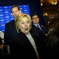U.S. Democratic presidential candidate and former Secretary of State Hillary Clinton greets supporters after delivering the keynote address at the Brookings Institution Saban Forum at the Willard Hotel in Washington Sunday. | REUTERS