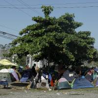 The tents of Cuban migrant refugees are seen at a border post with Panama in Paso Canoas, Costa Rica, Dec. 23. | REUTERS