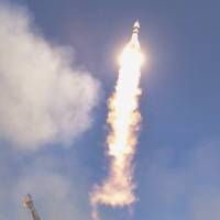 A rocket carrying a Russian Soyuz module carrying a cosmonaut and two astronauts blasts off for the International Space Station from the Baikonur Cosmodrome in Kazakhstan on Dec. 15.  | NASA / JOEL KOWSKY / AFP-JIJI 