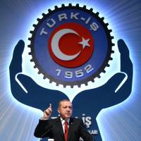 Turkish President Recep Tayyip Erdogan addresses a labor union meeting in Ankara on Thursday. | AP