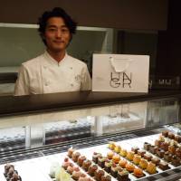 After honing his patisserie skills at highly regarded restaurants such as Guy Savoy and Le Chiberta in Paris and the Alain Ducas-produced Benoit in Tokyo, chef Fumiyuki Kanai has gone solo with Un Grain, a shop in Tokyo\'s Aoyma specializing in mignardises. | MARK THOMPSON