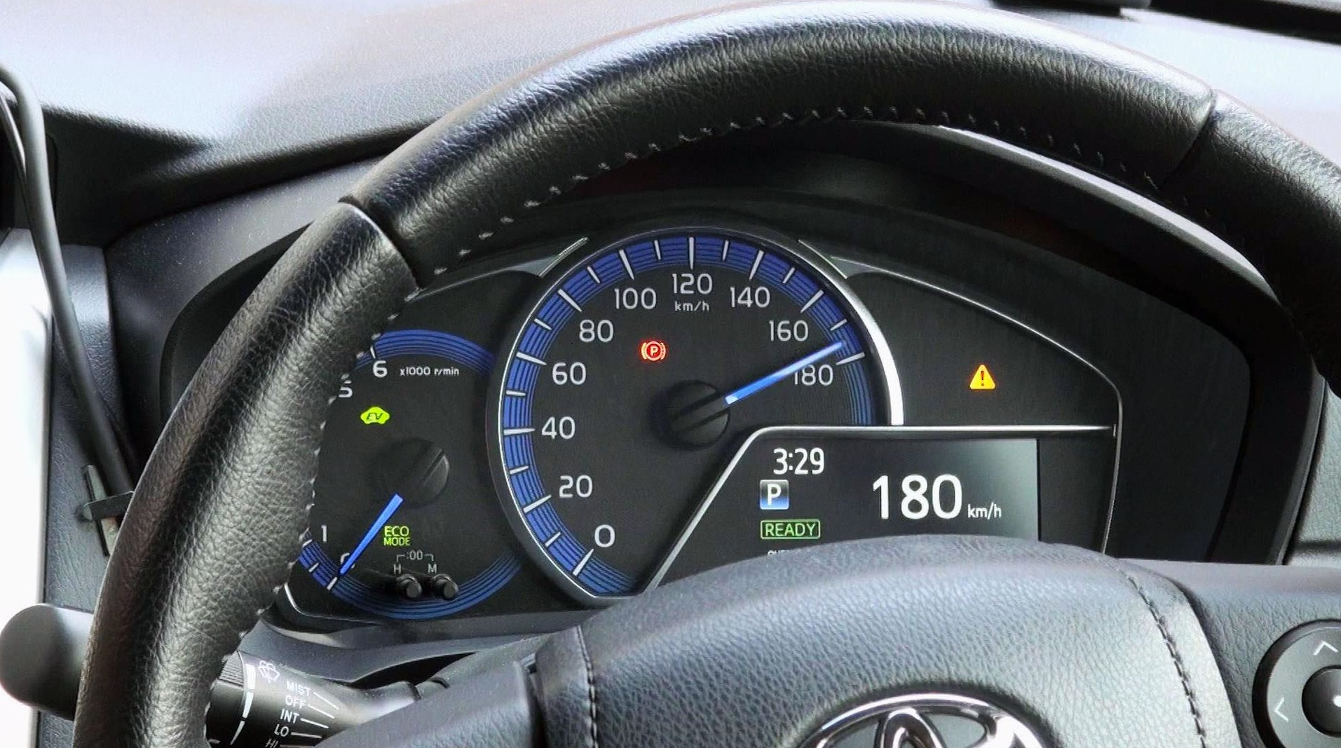 In a hacking experiment carried out in Hiroshima on Dec. 1, the speedometer in a parked vehicle shows 180 kph. | KYODO