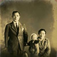 Rumiko Endo (center) and her parents pose for a photo in October 1942 after the family settled in Japan. | COURTESY OF RUMIKO ENDO