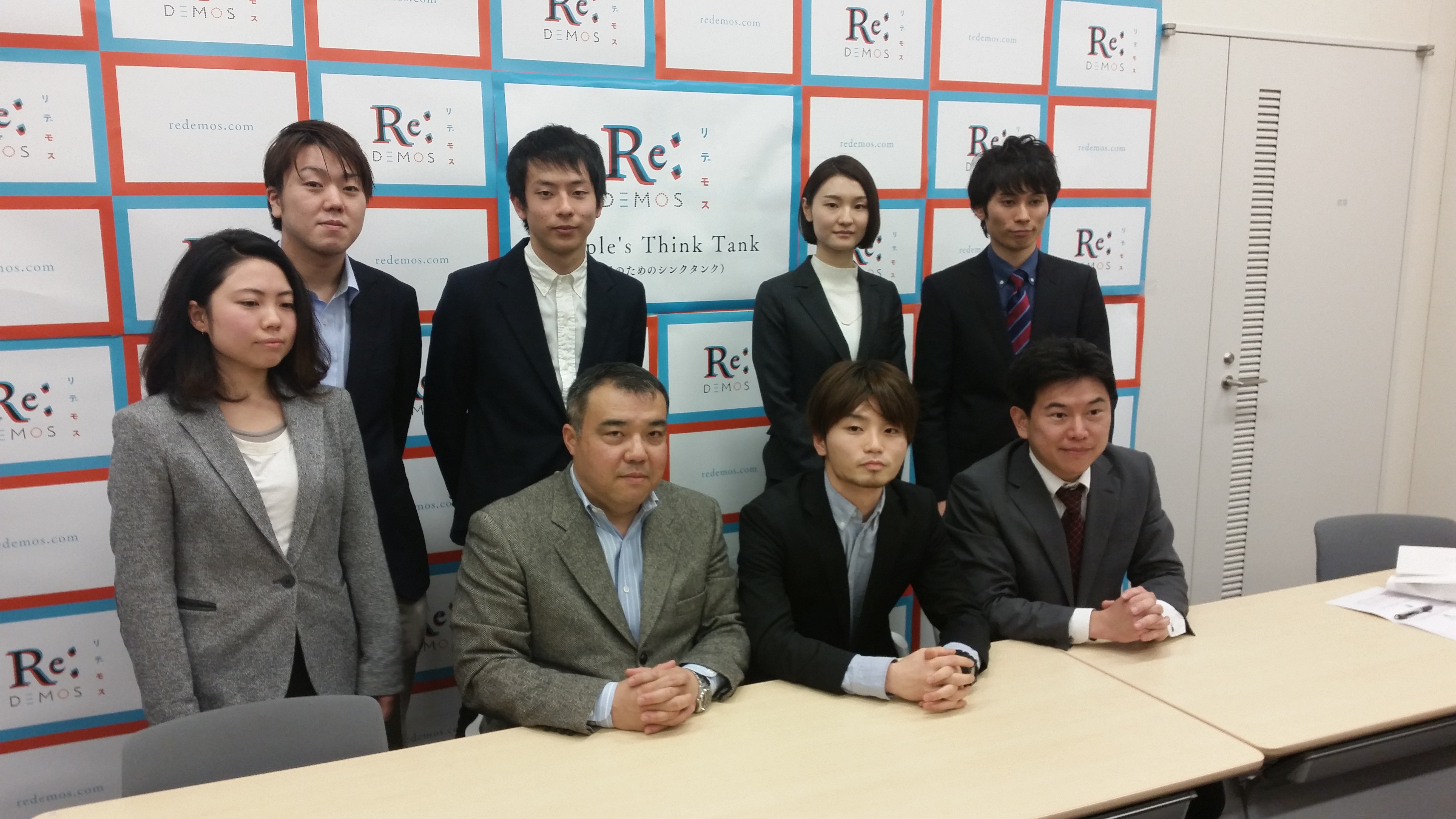 Aki Okuda (seated, center) and other members of Students Emergency Action for Liberal Democracy (SEALDs) announce the launch of a new think tank, ReDemos, in Tokyo on Monday. Seated at left is Koichi Nakano, a political science professor at Sophia University, and seated at right is attorney Takahisa Mizukami. | TOMOHIRO OSAKI
