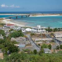 The lanes of Nohojima, an islet connected to Iheya Island by bridge, are useable but rundown. | STEPHEN MANSFIELD