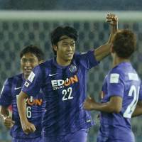 Sanfrecce\'s Yusuke Minagawa celebrates after scoring his team\'s first goal during Hiroshima\'s 2-0 win over Auckland City during the Club World Cup on Thursday in Yokohama. | REUTERS