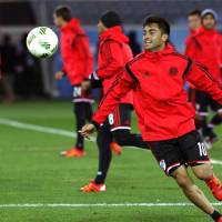 River Plate\'s Gonzalo Martinez chases the ball during  a training session on Saturday. | AP