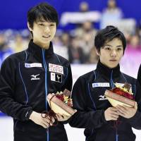 Yuzuru Hanyu (left) and Shoma Uno are members of the team that will represent Japan at the world championships in March. | KYODO