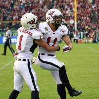 Waseda University wide receiver Takanori Moroguchi celebrates after catching a touchdown pass in the Koshien Bowl on Sunday. | KAZ NAGATSUKA