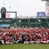The Ritsumeikan University Panthers celebrate after winning the Koshien Bowl on Sunday. | KAZ NAGATSUKA