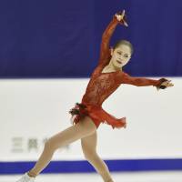 Satoko Miyahara performs her short program at the All-Japan Championships on Saturday in Sapporo. Miyahara is in first place with 73.24 points. | KYODO