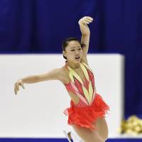 Wakaba Higuchi is in third place with 67.48 points. | KYODO