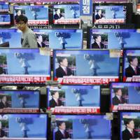 TV sets carry a news report about North Korea\'s nuclear test at a store in Seoul on Wednesday. | REUTERS