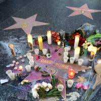 Fans in Los Angeles leave tributes by his star on the Hollywood Walk of Fame on Monday. | REUTERS
